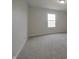 Bedroom with a window and wall to wall carpet at 15201 Slateford Rd, Noblesville, IN 46062