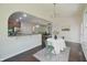 Dining area adjacent to kitchen with view into open floor plan at 15201 Slateford Rd, Noblesville, IN 46062