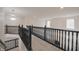 Upstairs hallway overlooking the living area at 15201 Slateford Rd, Noblesville, IN 46062