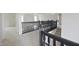 Spacious upper hallway with modern black railings and neutral carpeting at 15201 Slateford Rd, Noblesville, IN 46062