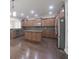 Modern kitchen features stainless steel appliances, granite countertops, and a kitchen island at 15201 Slateford Rd, Noblesville, IN 46062