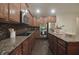 A close-up view of kitchen with stainless steel appliances and tiled backsplash at 15201 Slateford Rd, Noblesville, IN 46062