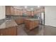 Contemporary kitchen equipped with stainless steel appliances, granite countertops, and ample cabinet space at 15201 Slateford Rd, Noblesville, IN 46062