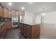 Updated kitchen showcasing stainless steel appliances, granite countertops, and a functional island at 15201 Slateford Rd, Noblesville, IN 46062