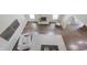 Open-concept living room features a fireplace and views of dining area at 15201 Slateford Rd, Noblesville, IN 46062