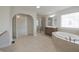 Stylish main bathroom with a glass shower, garden tub, and double sink vanity at 15201 Slateford Rd, Noblesville, IN 46062