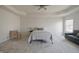 Bright main bedroom features a trey ceiling, a sitting area, and plush carpet at 15201 Slateford Rd, Noblesville, IN 46062