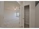 Spacious main bedroom with carpet, ceiling fan, and a glimpse of a walk-in closet at 15201 Slateford Rd, Noblesville, IN 46062