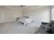 Spacious bedroom with neutral colors and a comfortable sitting area at 15201 Slateford Rd, Noblesville, IN 46062