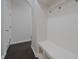 Mudroom features built-in bench and coat hooks with hall access at 15201 Slateford Rd, Noblesville, IN 46062