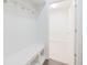 Mudroom features built-in bench, coat hooks, and access to additional storage at 15201 Slateford Rd, Noblesville, IN 46062