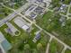 A bird's-eye view of the property highlights its location near businesses, parking, and residential areas at 1535 Whalen Ave, Indianapolis, IN 46227