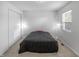 Bedroom offering carpet, a bed, lamps, natural light from a window, and space for relaxation at 1535 Whalen Ave, Indianapolis, IN 46227