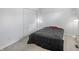 This bedroom has neutral carpeting, a closet with sliding doors, and overhead lights, creating a cozy and functional space at 1535 Whalen Ave, Indianapolis, IN 46227