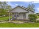 Charming one-story home with covered porch and landscaped front yard at 1535 Whalen Ave, Indianapolis, IN 46227