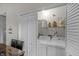 Convenient laundry closet equipped with modern appliances and storage shelves at 1535 Whalen Ave, Indianapolis, IN 46227