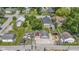 Spacious yard with multiple storage sheds and a detached two-car garage and mature trees at 1539 Evans Ave, Noblesville, IN 46060