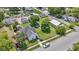 Aerial view of a home with a large lawn, mature trees, and neighborhood at 1539 Evans Ave, Noblesville, IN 46060