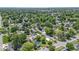 An aerial view of a neighborhood featuring mature trees and a variety of homes at 1539 Evans Ave, Noblesville, IN 46060