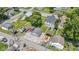 Spacious yard with multiple storage sheds and a detached two-car garage and mature trees at 1539 Evans Ave, Noblesville, IN 46060