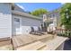 Outdoor deck provides the perfect space for relaxation, with chairs and privacy fencing at 1539 Evans Ave, Noblesville, IN 46060