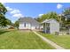 The backyard includes a lovely shed and a convenient sidewalk leading to the house at 1539 Evans Ave, Noblesville, IN 46060