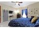 Bedroom with a large window and a TV mounted on the wall at 1539 Evans Ave, Noblesville, IN 46060