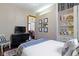 Bedroom with a large bed and a dresser in the corner at 1539 Evans Ave, Noblesville, IN 46060