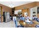 Spacious kitchen area boasts a round table, stainless steel refrigerator, and ample cabinet space at 1539 Evans Ave, Noblesville, IN 46060