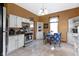 Kitchen and dining area with a modern range and stainless steel appliances at 1539 Evans Ave, Noblesville, IN 46060