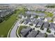 Panoramic aerial shot of a neighborhood featuring scenic ponds and green areas, offering a tranquil lifestyle at 15557 Starflower Dr, Westfield, IN 46074