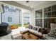Inviting covered patio with stylish furniture, outdoor lighting and ceiling fan at 15557 Starflower Dr, Westfield, IN 46074
