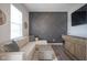 Living room features decorative wall, modern furniture, and stylish decor at 15557 Starflower Dr, Westfield, IN 46074