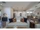 Open concept living room with a view of the modern kitchen and dining area at 15557 Starflower Dr, Westfield, IN 46074