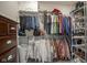 Spacious walk-in closet featuring built-in shelving, hanging rods, and ample storage space for clothes and accessories at 15557 Starflower Dr, Westfield, IN 46074