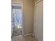 Bathroom entrance showcasing a floral shower curtain at 1584 Shady Ln, Columbus, IN 47201