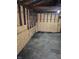 An interior view of the garage showing the frame and floor at 1584 Shady Ln, Columbus, IN 47201