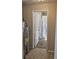 Hallway view leading to the bathroom and utilities at 1584 Shady Ln, Columbus, IN 47201