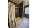 Tastefully renovated bathroom with a shower, tub and modern fixtures at 1628 Edgewood Dr, Anderson, IN 46011