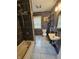 The stylish bathroom features tile walls, modern fixtures, and a shower with a tub at 1628 Edgewood Dr, Anderson, IN 46011