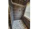 Beautiful new shower is adorned with tile and has a river rock base at 1628 Edgewood Dr, Anderson, IN 46011
