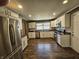Updated kitchen boasts stainless steel appliances, granite countertops, and ample cabinet space at 1628 Edgewood Dr, Anderson, IN 46011