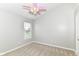 Bedroom features neutral walls, plush carpet, and a unique ceiling fan at 174 Straughn Ln, Westfield, IN 46074