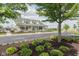 Charming clubhouse with covered porch, beautiful flowers and lush landscaping at 174 Straughn Ln, Westfield, IN 46074