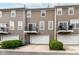 Exterior of townhomes with garages and individual balconies at 174 Straughn Ln, Westfield, IN 46074