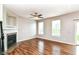 Open living room features a cozy fireplace, hardwood flooring, and a sliding glass door at 174 Straughn Ln, Westfield, IN 46074