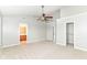 Main bedroom with ensuite bathroom and walk-in closet features neutral paint and carpet at 174 Straughn Ln, Westfield, IN 46074