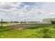 Sand volleyball court near pool and recreation area with lush green grass at 174 Straughn Ln, Westfield, IN 46074
