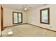 Bright bedroom featuring natural light, a ceiling fan, and light-colored walls at 1783 Cloister Dr, Indianapolis, IN 46260