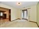 Bright living room with a large bay window and tile flooring at 1783 Cloister Dr, Indianapolis, IN 46260